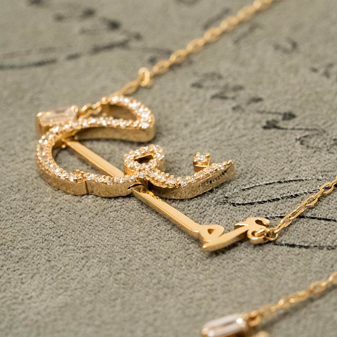 Ca–love–graphy Necklace - Um - Paved