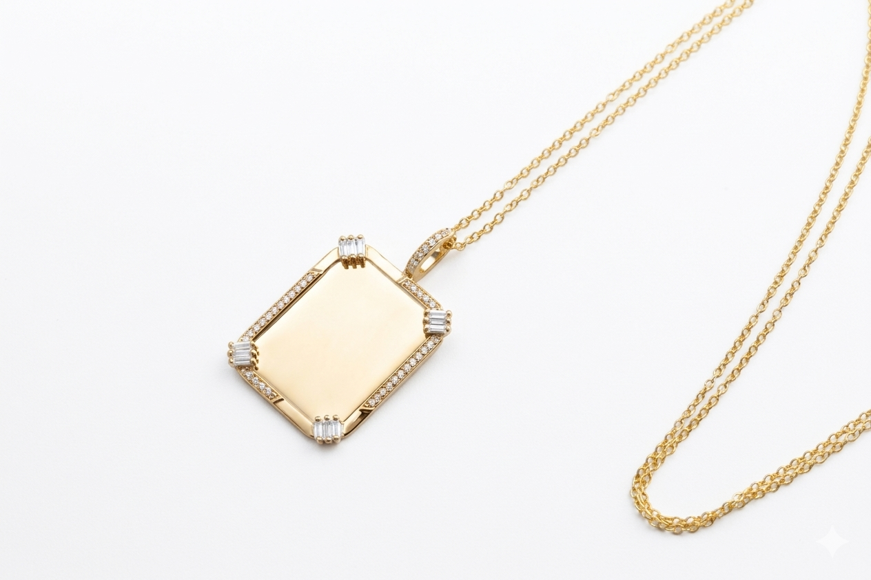 Gold necklace with a square pendant on a white background